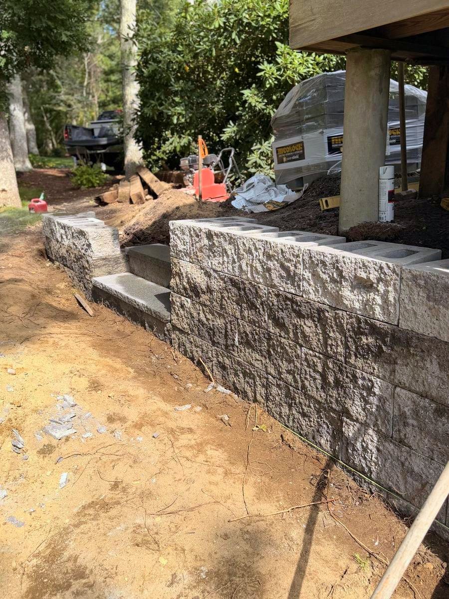 The wall and steps from the driveway side